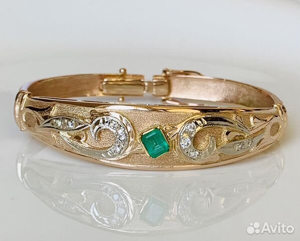 Золотой браслет с изумрудом и бриллиантами Золотой браслет с изумрудом и бриллиантами