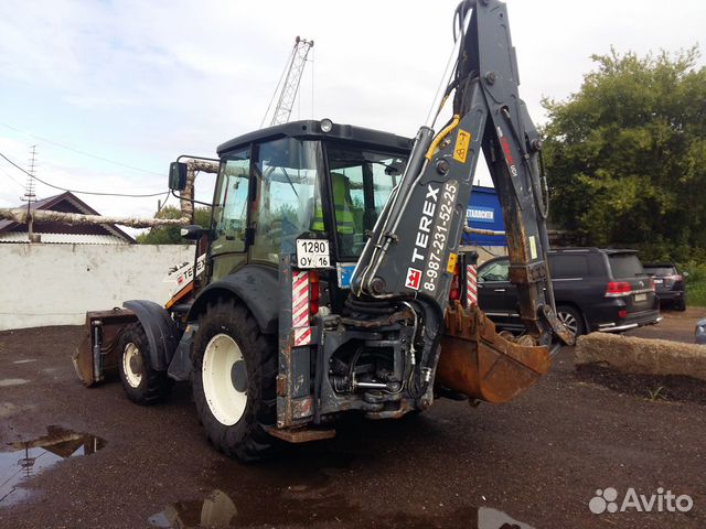 Экскаватор погрузчик terex 825 TLB 2013 год в