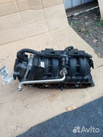 Коллектор впускной Opel Corsa D