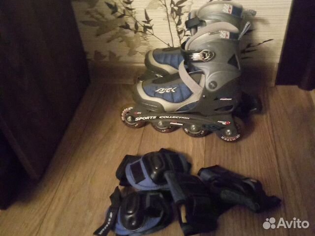 Роликовые коньки