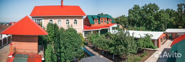 Коттедж 610 м² на участке 12 сот.