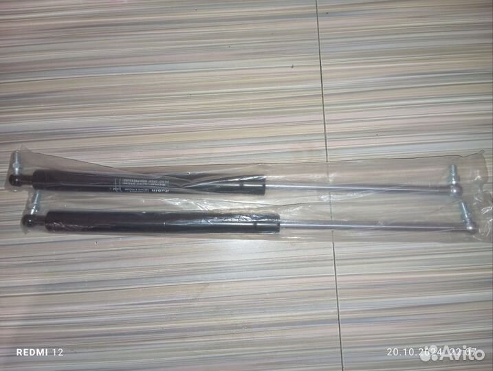 Газовые упоры багажника калина