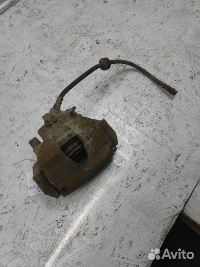 Суппорт тормозной передний левый Renault Megane