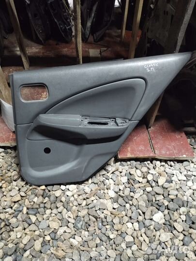 Обшивка двери зад. прав. Nissan Almera Classic B10