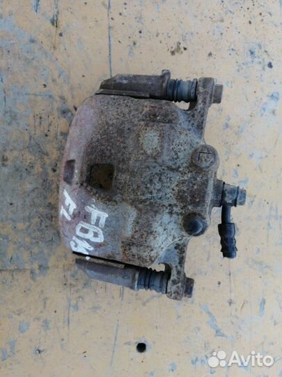 Суппорт передний левый Nissan Sunny FB15 QG15