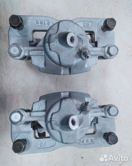 Суппорт передний левый/правый KIA Spectra 2000г