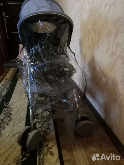 Прогулочная коляска трость
