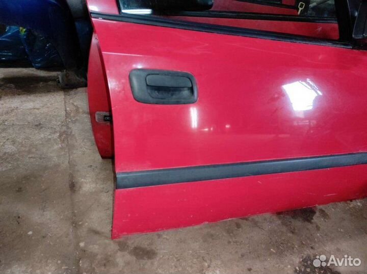 Двери передние Opel Astra G