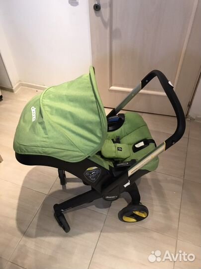 Коляска автолюлька doona