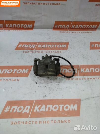 Суппорт тормозной передний левый Nissan Teana J32