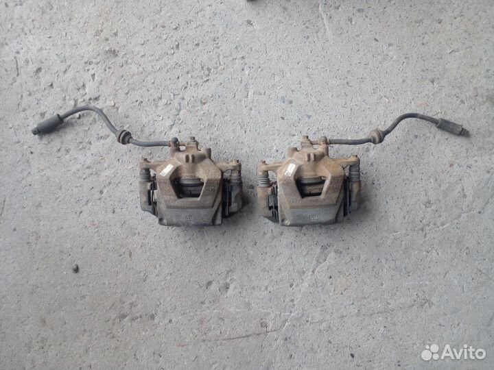 Суппорт тормозной передний Chevrolet Cruze