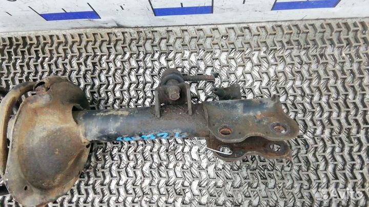 Стойка амортизатора заднего левого Nissan X-Trail