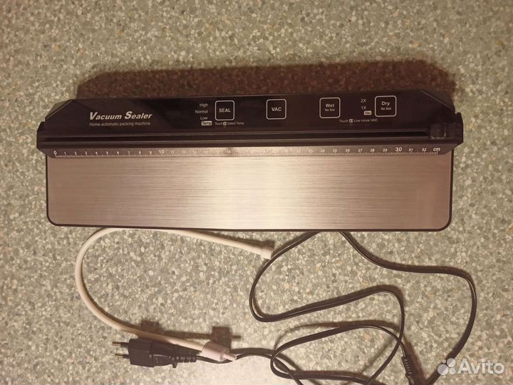 Вакуумный упаковщик