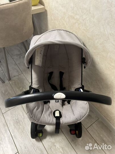 Коляска автокресло doona с базой isofix