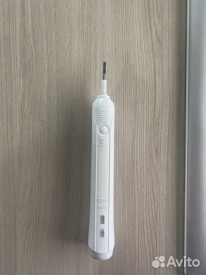 Электрическая зубная щетка