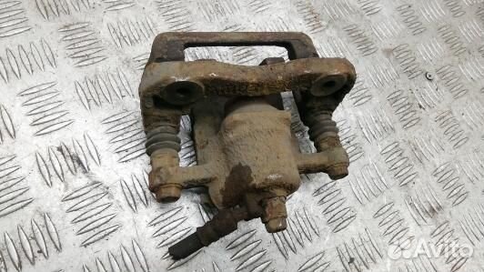 Суппорт тормозной задний левый KIA magentis MG (KE