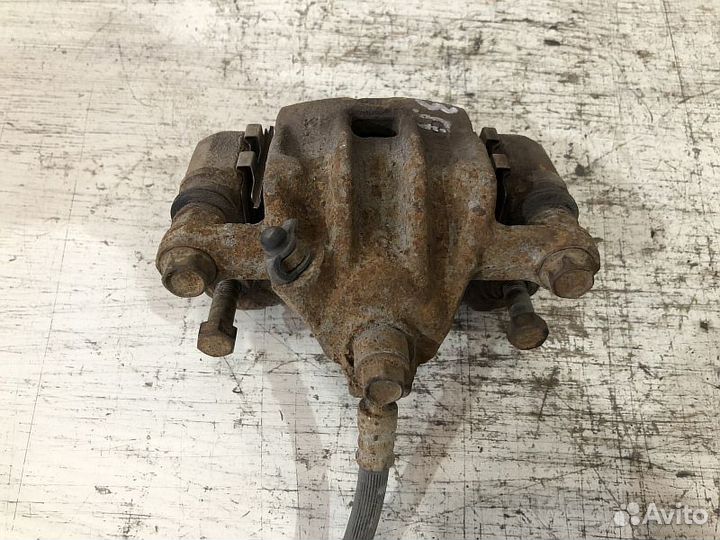 Суппорт тормозной задний Hyundai Getz