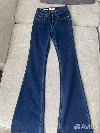 Джинсы клеш женские