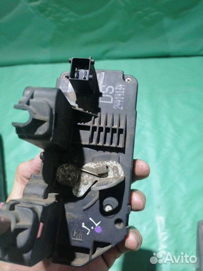 Замок двери задний левый Opel Astra G