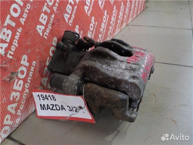 Суппорт задний правый Mazda 3 BL Z6 2010