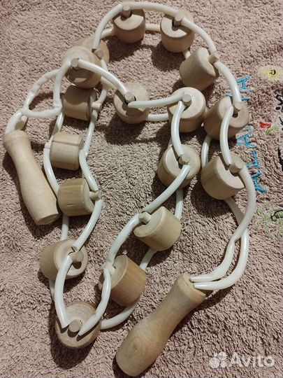 Роликовый ручной массажер для спины