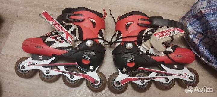 Роликовые коньки