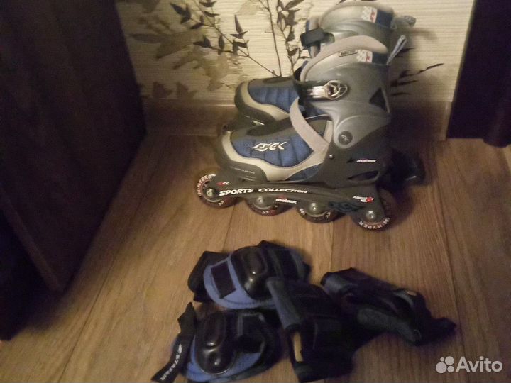 Роликовые коньки