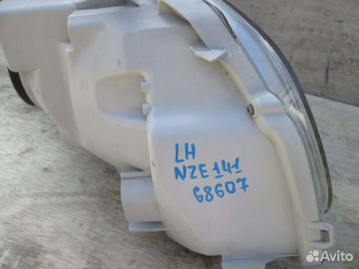 Фара левая Toyota Corolla Fielder NZE141 1NZ-FE