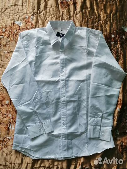 Продам новую рубашку на мальчика 164-170