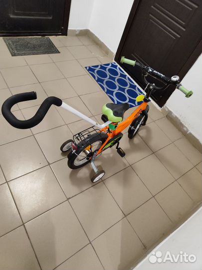 Детский велосипед с ручкой