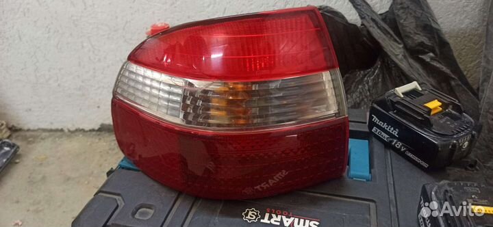 Фара задняя левая Toyota corolla EE111