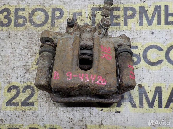 Суппорт задний правый Toyota Corolla (E120) 2000