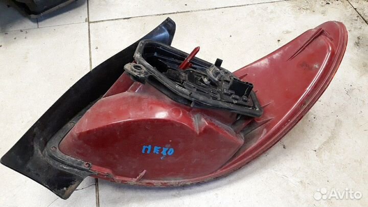 Фонарь левый Peugeot 206