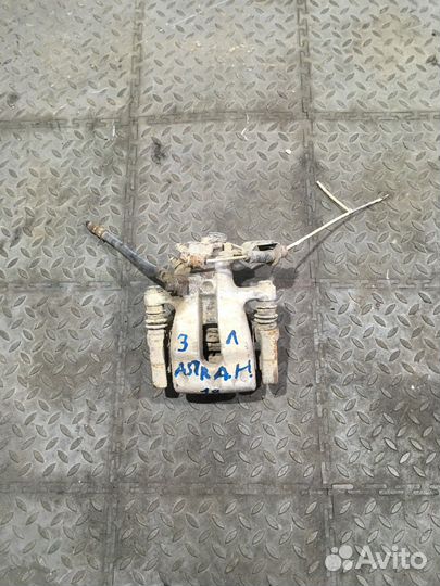 Суппорт задний левый