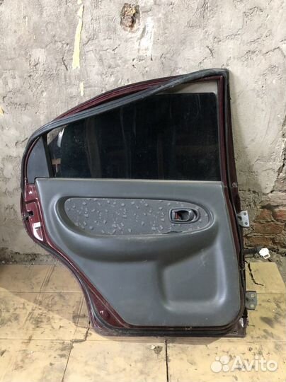 Задняя левая дверь Kia Spectra