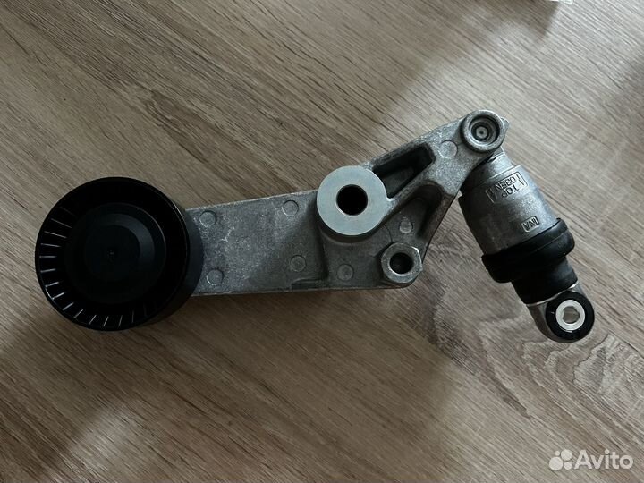 Натяжитель ремня