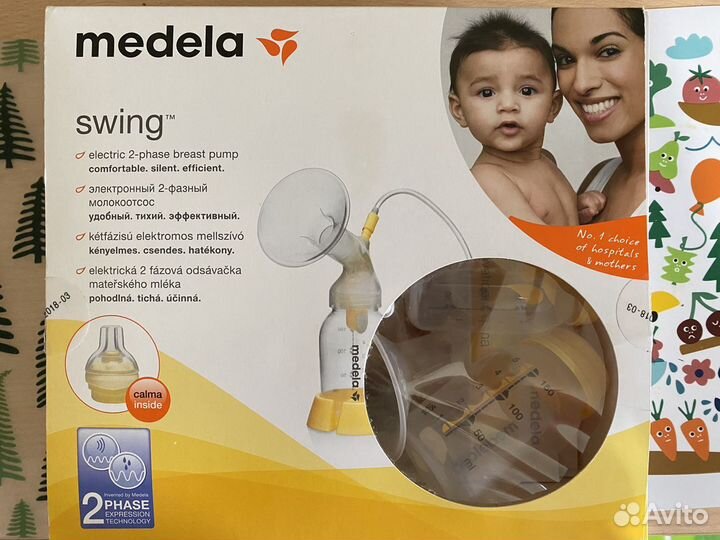 Молокоотсос Medela swing электрический