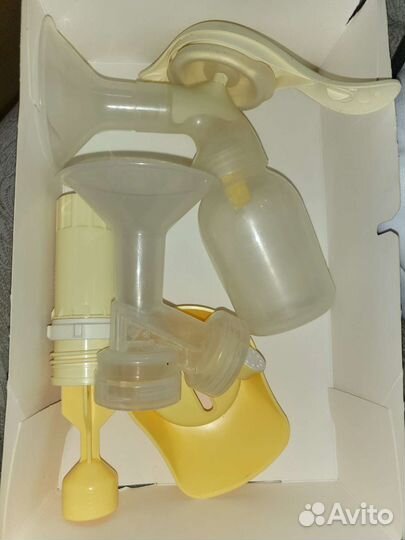 Молокоотсос ручной и пакеты для грудного молока
