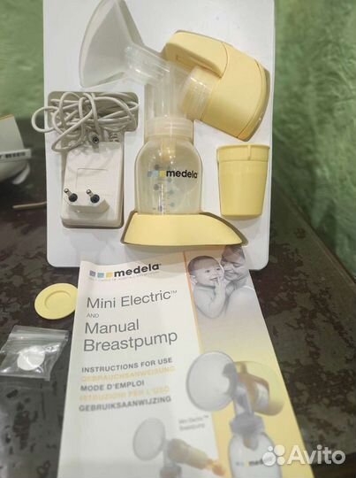 Молокоотсос medela электрический