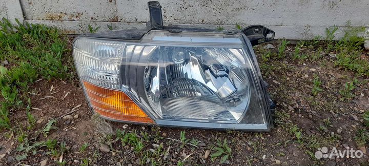 Передняя фара Паджеро 3 рейсталинг