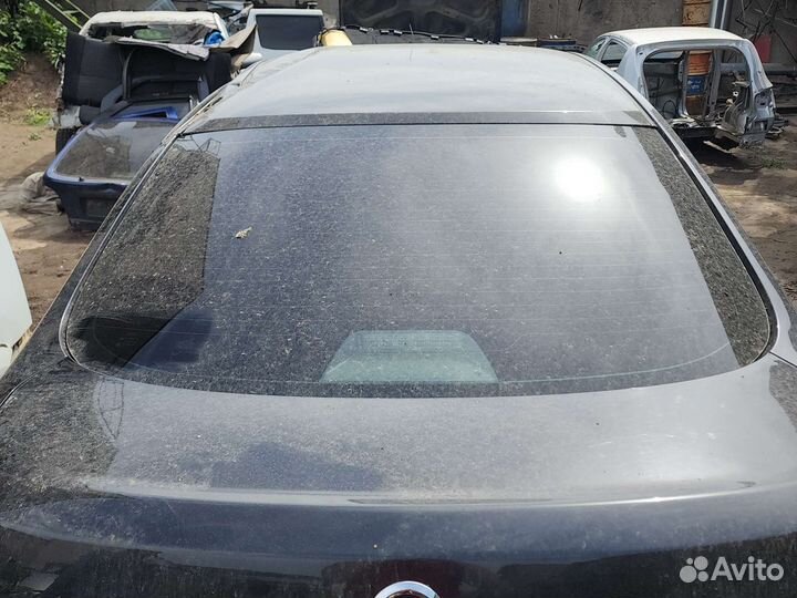 Заднее стекло Nissan Almera G15