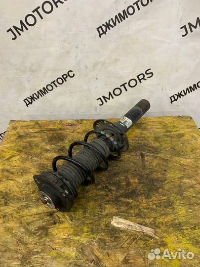 Стойка амортизатор Volkswagen Touran 1T левая