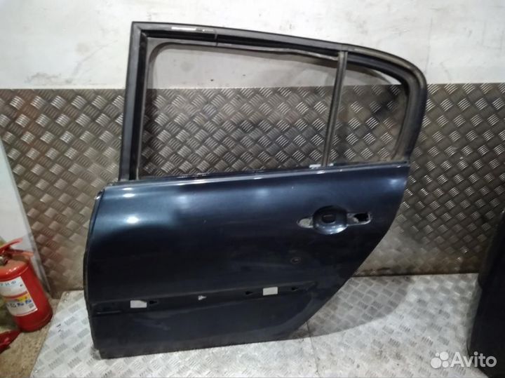 Дверь Megane 2 (03-09) зад L дефект б\у (арт. 7751475033)