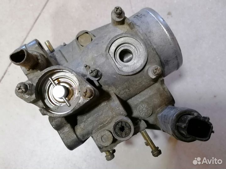 Заслонка дроссельная Nissan Almera N15