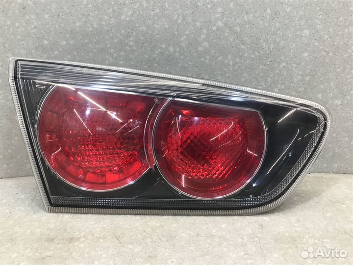 Фонарь задний внутренний левый Mitsubishi Lancer