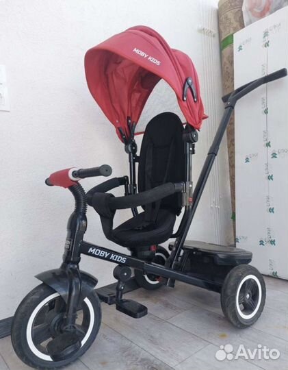 Трехколесный велосипед с ручкой