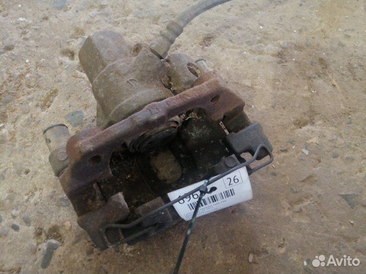 Суппорт тормозной задний левый Mazda 3 BL Z6 2011