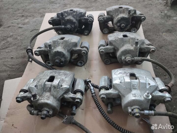 Суппорт тормоза передний Kia Cerato 3 YD 2012-20