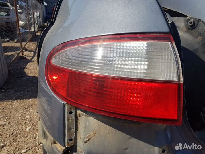 Фонарь левый наружний Шевроле Ланос хэтчбек
