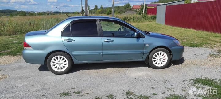 Mitsubishi Lancer 1.6 МТ, 2006, 266 000 км